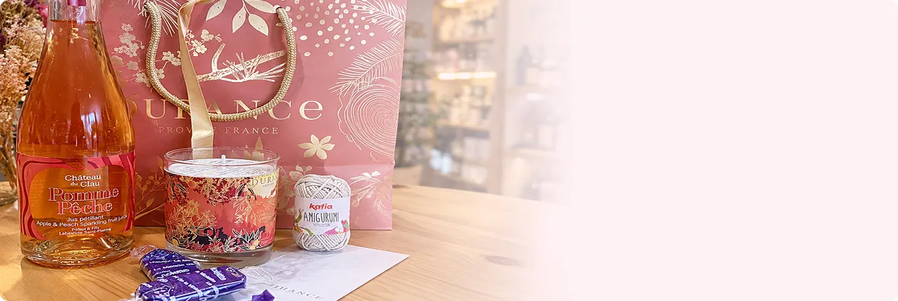 Idées cadeaux gourmands et artisanaux : pétillant, bougie parfumée et laine à Ô Comptoir des Passions